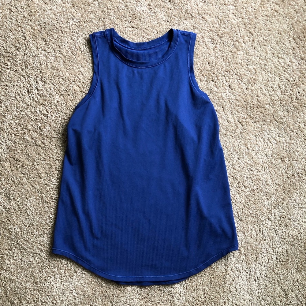Lululemon sleeveless Tank Women’s Blue Reflective Fitness medium small?